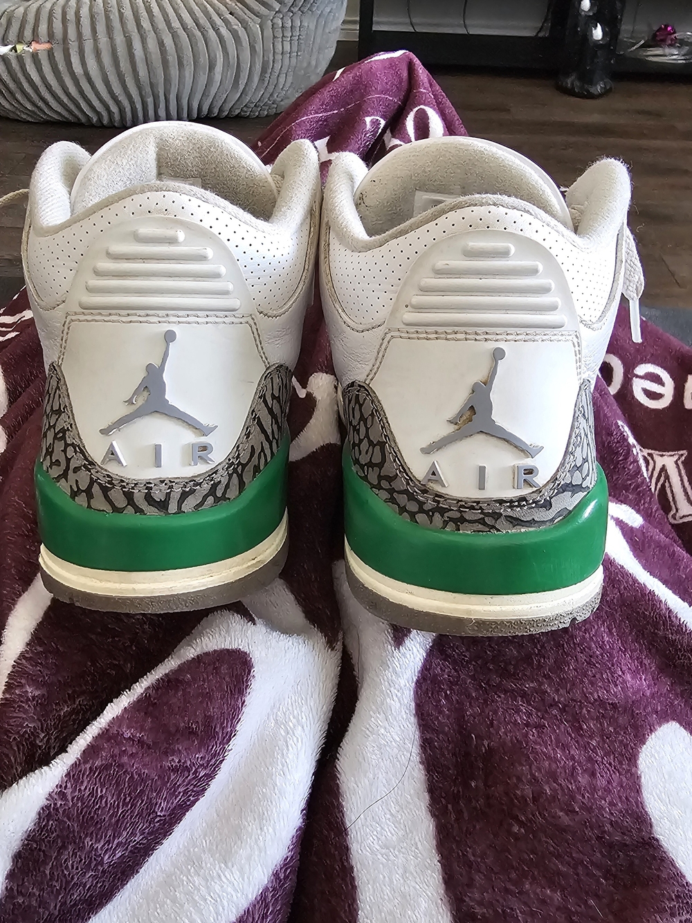Jordan White Retro Low Top Sneakers with Green Accents